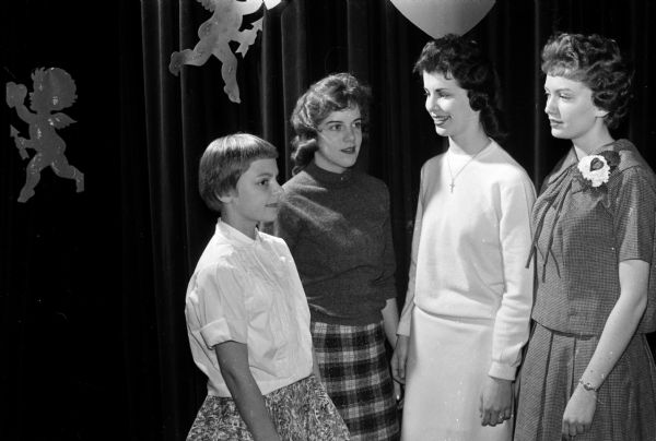 Among the daughters at the Elks Club banquet were Philayne Knutson, daughter of Mr. and Mrs. Clinton Knutson, Oregon; Lois Ann Joyce, daughter of Mr. and Mrs. James (Avis) Joyce, 432 Holly Avenue; JoAnn Gottsacker, daughter of Mr. and Mrs. Francis (Lydia) Gottsacker, 114 South Midvale Blvd. and Mary Kay Sullivan, daughter of Mr. and Mrs. Kenneth F. (Virginia) Sullivan, 4125 Nakoma Road.