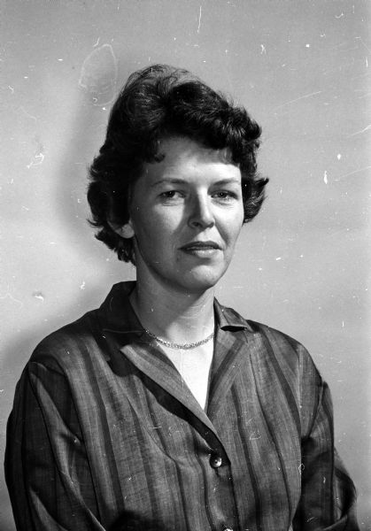 Portrait of Marian Callaway, an office secretary at the Veterans Administration Hospital, and a bowler in the VA hospital League. Her 268 game was the highest rolled in Madison Woman's Bowling Association league competition.