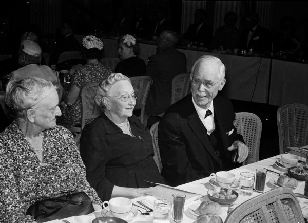 Among the attendees at the 50th anniversary meeting of the Dane County chapter of the American Red Cross are, left to right: Katherine Edwards and her sister, Helen Fairchild; and former Wisconsin Supreme Court Chief Justice Edward T. Fairchild. The two sisters are children of charter members of the first Red Cross chapter founded in Dansville, New York by Clara Barton.