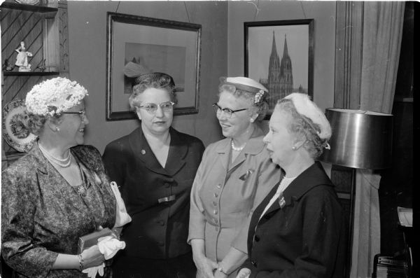Four members of the American Association of University Women attend their annual May breakfast. Left to right are: Mildred Davis, Beulah Von Eschen, Marion Rafoth, and Mrs. Paul Cody of Randolph.