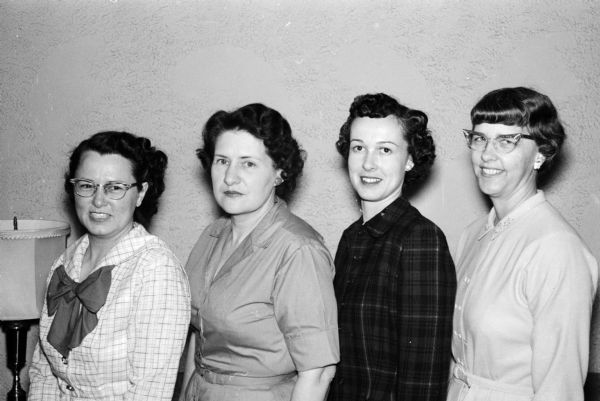 New officers of Pentagon (an organization of wives of faculty members of the University of Wisconsin School of Engineering) are, left to right: Jean Myers, President; Marion Peterson, vice-president; Mary Young, treasurer; and Helen Villemonte, secretary.