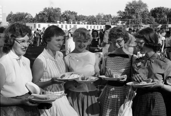 The sessions, at the 4-H picnic, centered along the theme: "Preparing Today for Tomorrow" and were held Monday through Thursday on the University of Wisconsin campus. Five of the participants are, from left: Minnie Evers, Randolph; Karen Reed, Portage; Betty Degroff, Poynette; Donna Russell, Randolph; and Joyce Carncross, Lodi.