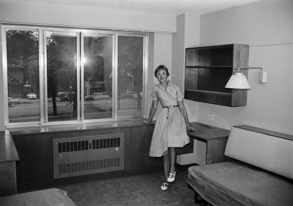 Joy Justesen of Sun Prairie poses in her room in the University's new dormitory, Chadbourne Hall, as she participates in the advance registration process for University of Wisconsin freshmen.