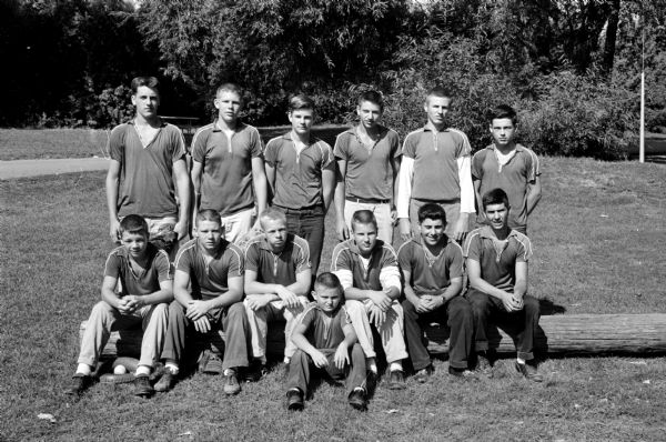 Group portrait of the H & I Variety Junior baseball team, champions of the Madison Boys Baseball program.