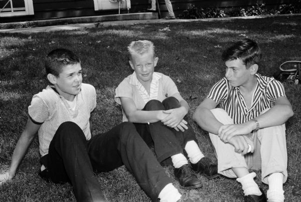 Madison low handicap junior golfers from Madison's three golf clubs compete in the annual inter-club tournament at Blackhawk Country Club. 18-hole representatives shown (L-R) are Rick Radder, Blackhawk; Philip Shuler, Maple Bluff; and Ken Grafton, Nakoma.
