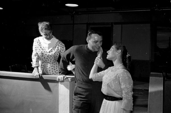 Carol Bryant, Robert Rancourt and Nancy Fowlkes act out a scene from "The Cold Wind and the Warm", the opening play of the Madison Theater Guild season presented in the East High School Auditorium.
