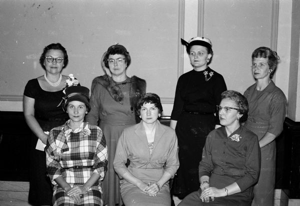 Officers were elected by the Women's Auxiliary to the Wisconsin Chiropractic Association. Pictured are the new officers with other leaders at the state meeting. Standing, left to right, are: Mrs. S.C. Syverud, Mt. Horeb, installing officer; Mrs. L.S. Frondal, Eau Claire, secretary; Mrs. W.C. Wachsmuth, Wausau, luncheon toastmistress; and Betty Stacy, treasurer. Seated are: Mrs. R.E. Jacquette, Milwaukee, president-elect; Mrs. H.A. Naidl, Manitowoc, out-going president; and Mrs. D.L. Witte, Brodhead, president.