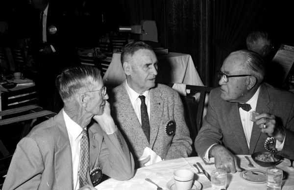 William Renk (left) of Sun Prairie, Thomas Jones, and Robert Nichols attend the Downtown Rotary Club luncheon.