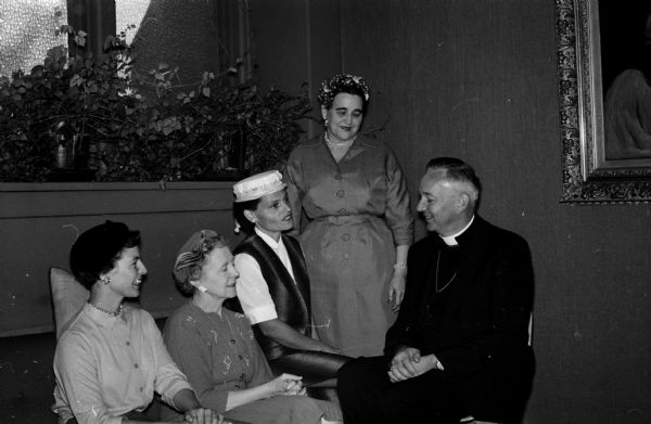 Bishop Donald A.V. Hallock (right) of the Milwaukee diocese of the Episcopal church is shown with officers of the Episcopal Churchwomen of the Northwest Convocation at a meeting held at Grace Church. The women include Mrs. Thomas Thompson, Wisconsin Dells, secretary; Mrs. E.A. McNeil, Kenosha, diocesan president; Mrs. John Scott, Lake Delton, treasurer; and Eleanor Nerdrum, Madison, chairman of the Northwest convocation.