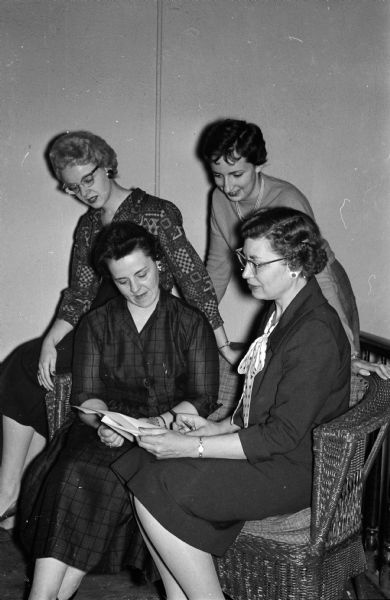 "Harvest of Fashions" is the theme for the annual benefit style show of Beta Sigma Phi.  Pictured are members of the four Madison chapters who are serving on the committee. Seated left to right: Sara Roth, Gamma; and Eleanore Oimoen, Xi Beta. Standing Judy Ahrens, Alpha Iota, and Jackie Miller, Phi Zeta.