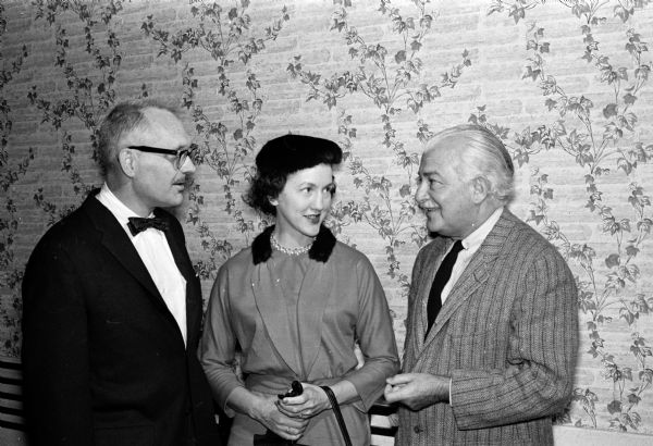 Boston "Pops" orchestra conductor Arthur Fiedler speaks with Elizabeth Monschein of WHA and Cliff Roberts of WIBA. Fiedler was in Madison to speak to representatives of radio, television, the record industry, and the press.