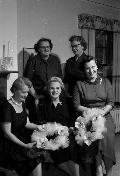 Members of the Mendota Gardeners plan their annual public flower show. Seated left to right are: Gladys Dulin, Ann Gordon, and Viola Keller. Standing: Ruth Bass on left, and Kristie Kaiser.