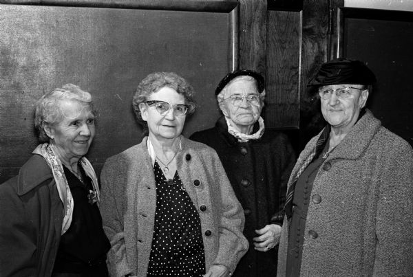 Portrait of four senior citizens, among the over five-hundred who attended the Christmas party put on by Sigma Alpha Epsilon fraternity. Left to right are Mida Thrasher, Bertha Olson, Mrs. Elizabeth Armstrong, and Mrs. Alice Crabtree.