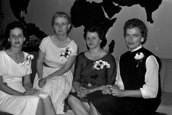 Members of the Dane County Medical Assistants install their new officers at a party held at the Star Dust Supper Club. Left to right are: Terry Klousie, retiring president; Violet Owen, installing officer and past state president; Lucille Skolaski, new president; and Maureen Saunders, president-elect for 1961.