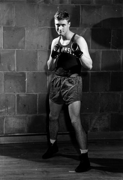 University of Wisconsin boxer Bob Gottschalk, Falls Church, Virginia, boxes at 178 pounds.
