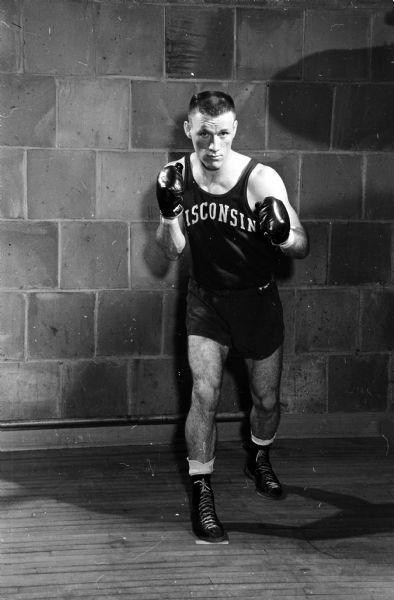 University of Wisconsin boxer Howard McCaffery, Sault Ste. Marie, Michigan, boxes at 139 pounds.
