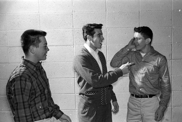 Monona Grove High School students rehearse for the musical "Call Me Madam." Left to right are Bob Jaeger, Bill DuBois, and Don Harvey.