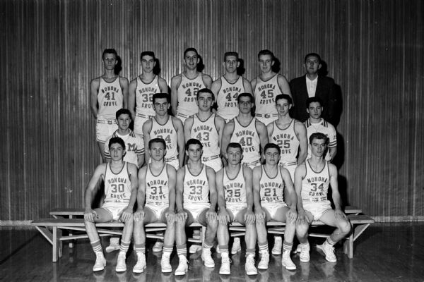 Group portrait of the Monona Grove High School basketball team.