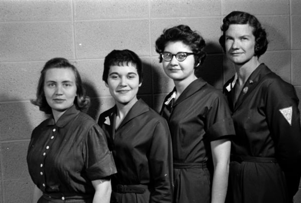 Four new employees were added to the staff of the Visiting Nurse service, a Red Feather agency with headquarters at 2059 Atwood Avenue. They include, from left: Nancy Diedrick, a public health student nurse at the University of Wisconsin School of Nursing; Barbara Burgess, R.N.; Dorothy Geiger, R.N.; and Barbara Adams, physical therapist. The staff now includes 13 employees under the supervision of Agnes Griffith.