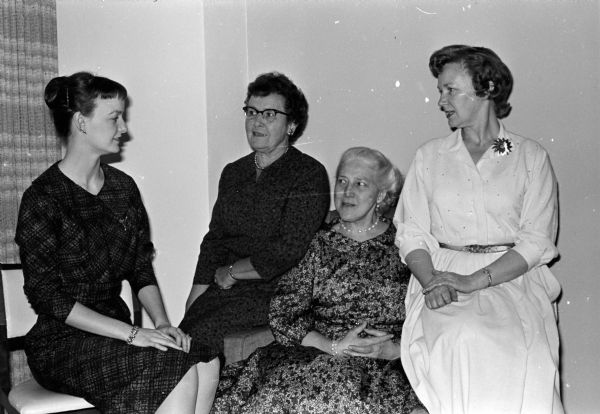 The eighth annual benefit musicale is being planned by active, alumnae, and patroness members of Sigma Alpha Iota. Left to right are Barbara Merkel, president of the Rho chapter; Eleanor Carter, patroness chairman; Idelle Strelow, general chairman; and Elaine Ramsted, alumnae president.