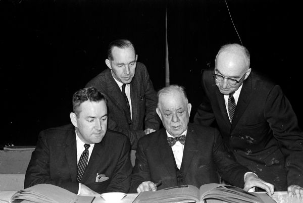 The Wisconsin Veterans of Foreign Wars community service records for 1959 were judged by this committee. Left to right are: Bjarne Romnes, 4215 Waneta Trail, division of children and youth, State Department of Public Welfare; Nathan Heffernan, 2117 Kendall Street, Deputy Attorney General; A. Matt Werner, Sheboygan, a University of Wisconsin regent and George Currie, 4130 Manitou Way, State Supreme Court justice.