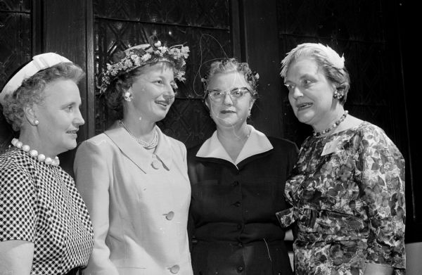 Four members of the arrangements committee attend a gathering of the Madison Circuit of Women of the Evangelical Lutheran Church at Bethel Lutheran Church. Left to right are: Mrs. Marguerite Munson, Mrs. Lydie Marquart, Mrs. Lillian Bakken, and Ms. Grace Thompson.
