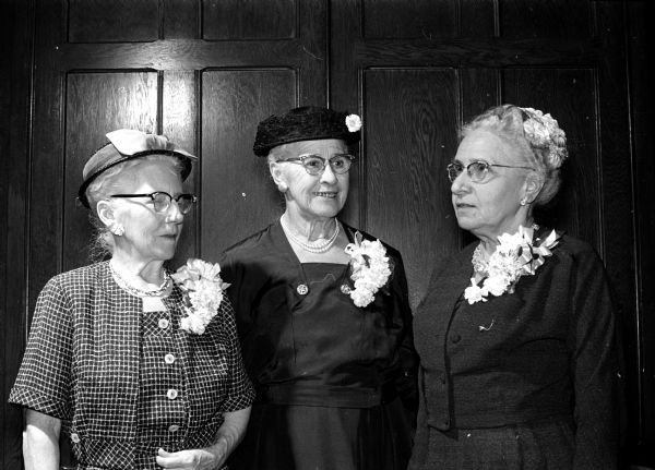 Group portrait of three long-time members of the Madison Circuit of Women of the Evangelical Lutheran Church who attended a gathering in Madison. Left to right are: Mrs. Emma Anderson of Madison; Mrs. Joseph Farness of DeForest, and Mrs. Knutson of DeForest.