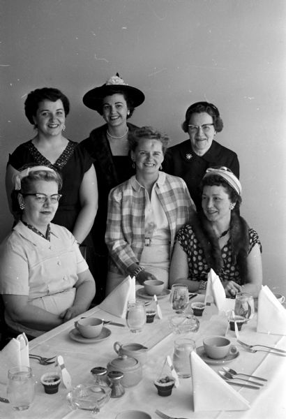 Group portrait of the officers of the Ladies Municipal Bowling League at their recent luncheon held at Stardust, 2725 Broadway Street. They include, seated from left to right: Avis Muckenhirn, secretary; Elvi Traisman, president; Elaine Hoppe, treasurer; Standing, left to right: Wanita McGinnis, publicity chairman; Minnie Swan, luncheon Chairman and Agnes Edgerton, vice-president.