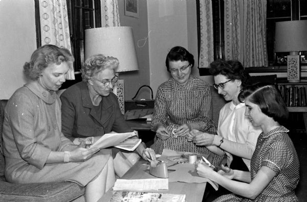 Reservations are being taken for the Madison League of Women Voters' membership tea at the Executive Residence. Left to right: Katherine Benz, Gretchen Ihde, Dorothy Johnson, Alicia Ashman, and Rosemary Cole.