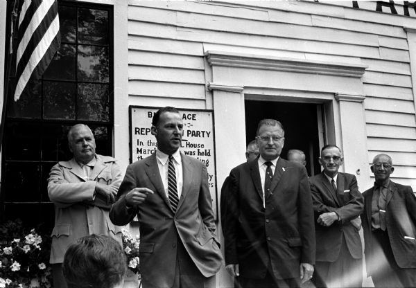 A Republican campaign starts at the Little White Schoolhouse, also known as the Birthplace of the Republican Party. Philip Kuehn, Republican candidate for governor, is the second man on the left.
