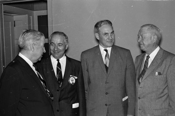 Members of the Lions Club and their guests gather at the Park Hotel to mark the 37th annual observance of Constitution Day. The day marked the 173rd anniversary of the signing of the American Constitution. Shown (from left to right) are: Chief Justice John Martin, state Supreme Court, Atty. Maurice B. Pasch, master of ceremonies; Gerald C. Gearty, Special Agent, FBI Milwaukee office and main speaker; and Herman W. Sachtjen, retired Circuit Court judge.