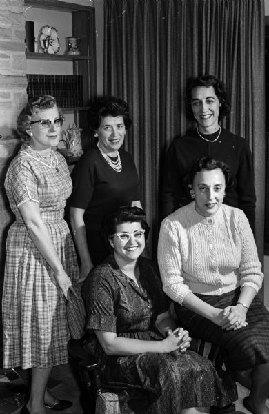 Leaders in planning the annual Yom Kippur dance sponsored by the sisterhood of Beth Israel Center are shown. Seated are: Bertha Friedman and Margeret Barkin. Standing are: Annette Sweet, Bessie Frank, and Helen Frank.