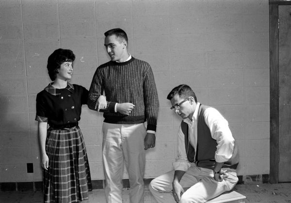 Group portrait of Mary Jambois, Doug Wenger, and Deane Drury, all who have leading roles in the production of "Brigadoon" by Monona Grove High School.