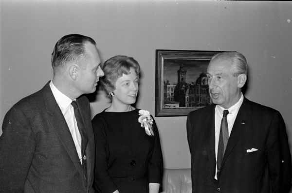Maj. Alexander de Seversky (right), speaker at the Air Power banquet at the Wisconsin Memorial Union, speaks with Donald Alexander and Marian Alexander.