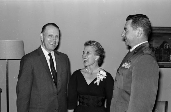 Among those attending the Air Power Banquet at the Wisconsin Memorial Union (left to right) are: Dr. Conrad Elvehjem, president of the University of Wisconsin, Ruth Olson, and Col. Olin E. Gilbert.