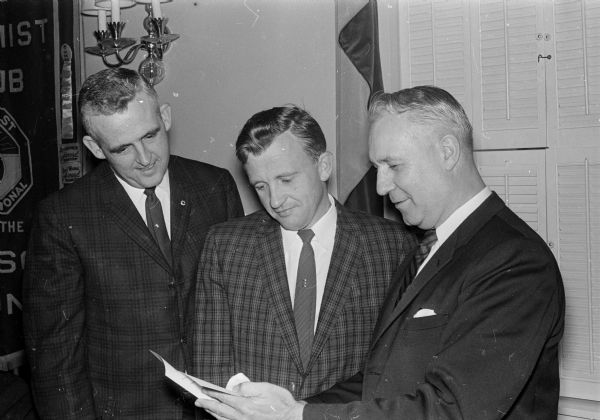 Speakers at the youth appreciation banquet, sponsored by the six Madison Optimist clubs are, at right, LeRoy Luberg, U.W. dean of students. At center is Dr. Daro Buchanan, toastmaster and at left, Dr. Richard O'Brien, president of the Northeast Optimist club. LeRoy Luber is seen outlining his talk on "Youth Forms Our Future."