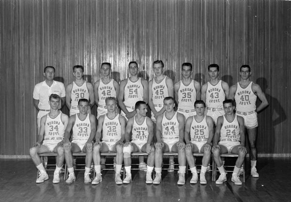 The title favorite Monona Grove basketball team is left to right, Front row: Earl Kielley, Ron Johnson, Norm Anderson, Lloyd Dresen, Ron Persike, Dave Doyle and Ken Redders. Second row: Coach Frank Hlavac, Jack Merrill, Clayton Russell, Chuck Swanson, Glen Kielley, Dave Johnson, Duane Johnson and Sonny Redders.