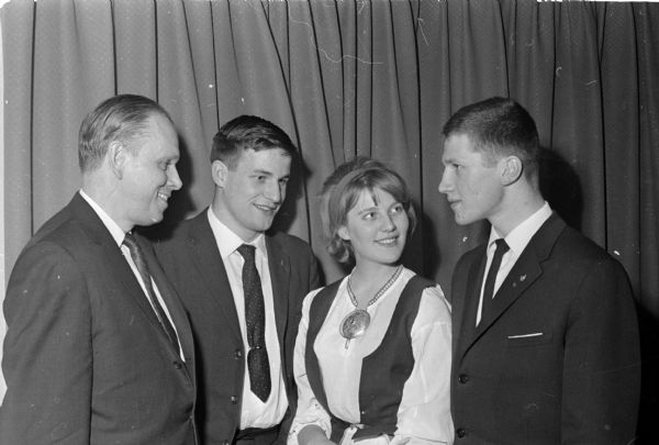 Attendees at a dinner for Brittingham scholars, held at the Tree and Poodle Dog restaurant, include from left to right: UW President Conrad A. Elvehjem; Hendrik Timmerman from Utrecht, the Netherlands; Anna-Maija Karvoner from Helsinki, Finland; and Otto Tuomaia from Porvoc,Finland.  Thomas Brittingham Jr. died April 16, 1960. The Brittingham Scholars program, founded in 1953 continued through 1962.