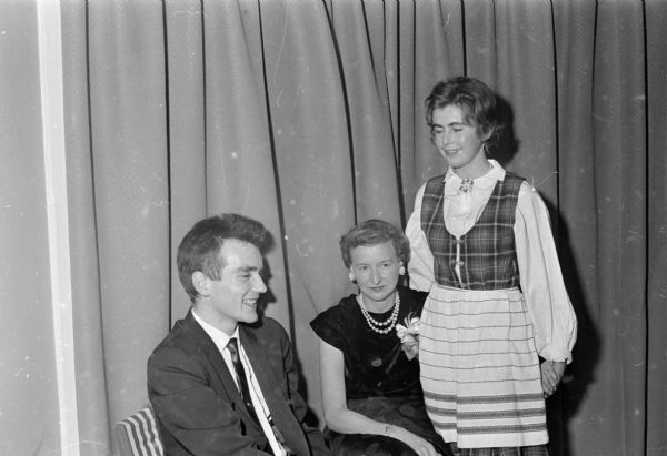 Attendees at the dinner for U.W. Brittingham scholars include, at right, Anne K. Paulsen from Drammen, Norway in her national costume. She is with Olafur Peturssor from Revkjavik, Iceland and special guest Leola Hays, assistant director of admissions. Thomas Brittingham Jr. died April 16, 1960. The Brittingham Scholars program, founded in 1953 continued through 1962.
