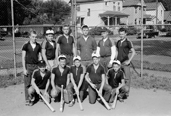 Group portrait of Wing's Inn baseball team in the East Junior Central League.