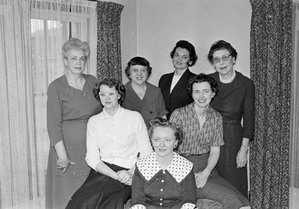 The Madison Council of United Church Women committee plans for annual "World Day of Prayer" event to be held on February 17, 1961 at Grace Episcopal Church and Luther Memorial Church.
Shown seated (left to right) are: Mrs. Wilbur Behrend, Glenwood Moravian Church; Mrs. William Roehm, committee general chairman, Messiah Lutheran Church; and Mrs. Donald Wilkinson, First Methodist Church.
Shown standing (left to right) are: Mrs. Oliver Munz, Good Shepherd Lutheran Church; Mrs. F. Earl Dye, First Congregational Church; Mrs. Harold Johnson, Luther Memorial Church; and Mrs.Lloyd Rader, Christ Presbyterian Church.