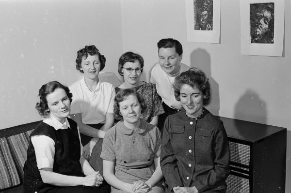 Members of the University League, Junior division planning committee gather for the annual style show and brunch. In the bottom row are: Judith Little, Carol Mathis, and Marilyn Mathews. In the top row are: Jeanne Grover, Carolyn Peterson, and Mrs. Gerald Connell.