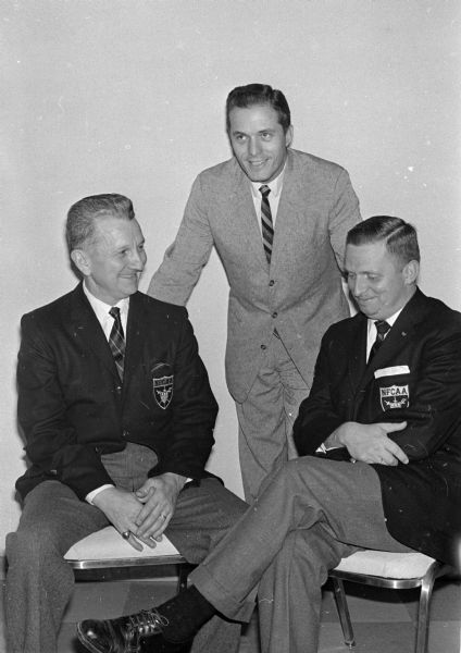 Coaches at the Big Ten 33rd annual Fencing Meet are, left to right, Charles Schmitter of Michigan State, Robert Kaplan of Ohio State, and Archie Simonson of Wisconsin.