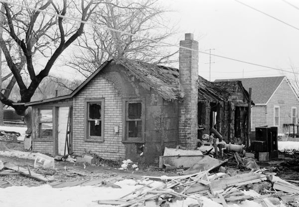 Exterior view of the ruins of a Stoughton home destroyed by a fire which resulted in the death of the inhabitants, brothers Irving and John Grams.