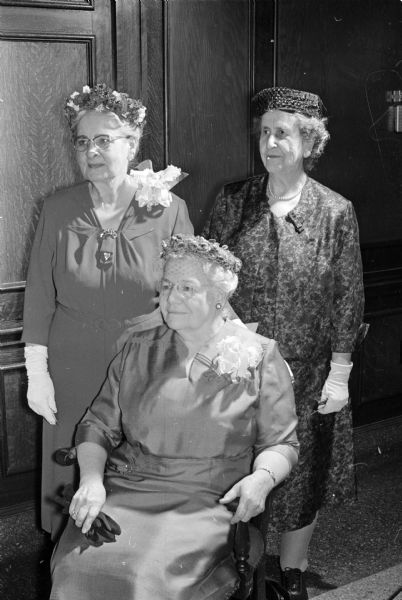 Frances Zuill, seated, associate dean of home economics at the University of Wisconsin, was honored by members of the Wisconsin Home Economics Association for 43 years in the field of home economics.  With Dean Zuill are, left to right: Dr. Gladys B. Chalkley, Riverside, California, consultant for the College of Home Economics at Southern Illinois University; and Frances Swain, La Crosse, retired chairman of home economics for the Chicago Public Schools. Each woman is a past president of the American Home Economics Association.