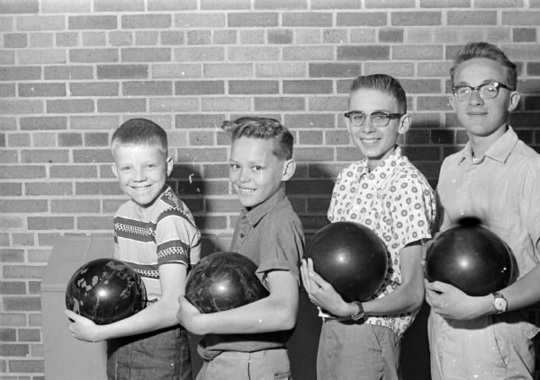 Burr Oaks Bowl junior bowling team comes in second place in the Madison Junior League bowling league losing to the Bowl-A-Vard team at a roll off at the Burr Oaks Bowl lanes.
Shown left to right are: Jon Smith, Bill Michaelk, Tom Michaelk, and Terry Walsh.