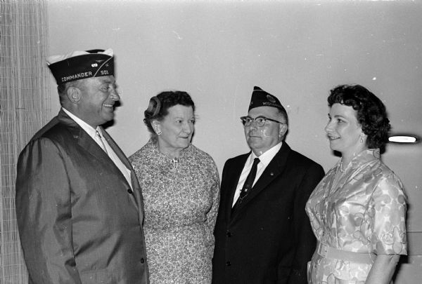 For the third year in a row, American Legion Post 501 of Madison has brother-sister combinations in leadership positions. Clarence Hardy, third from the left, was installed as post commander, and his sister, Marcella Leppien, fourth from the left, was installed as auxiliary unit president. Norman Muth, on the left, was installing officer for the Legion, and Alice Kent, second from the left, was installing officer for the auxiliary unit.