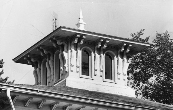 Cupola-adorned top portion of the Van Bergen/Bowen house, 302 South Mills Street, built by Seth Bergin, a farmer and real estate investor, in 1846 in the Italinate style. Dr. James Bowen, Madison's first homeopathic physician, lived in the house from 1859 to 1881. His daughter Susan Bowen Ramsey inherited the house, as did his grandson James Ramsey.
