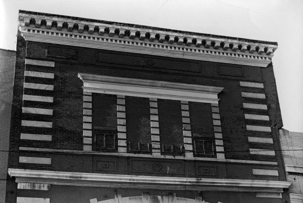 Upper brick facade of the Majestic Theater, Madison's oldest operating theater, at 115 King Street. The Majestic was built by Edward F. and Otto J. Biederstaedt and had its grand opening as a vaudeville house on December 15, 1906.