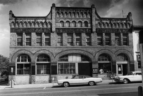 A majestic brick building which housed the Teckmeyer Candy Company, the Globe Bakery, and the original Buy-and-Sell Shop before the State of Wisconsin took it over in 1969. The building was located at 223 East Main Street.